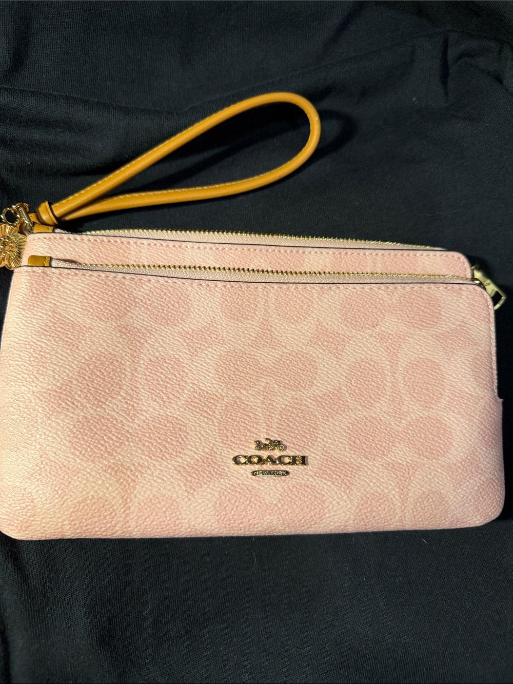 Coach Pale Pink Signature Wristlet with Tan Strap